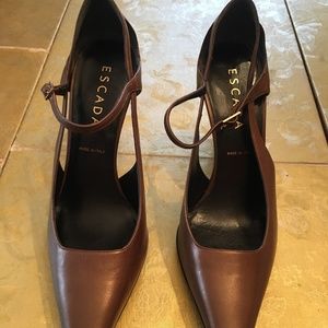 Escada leather with gold metallic backed heels.